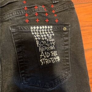 Ksubi Black Slim Straight Jeans with Red Cross-Stitch and White Pocket Graphic